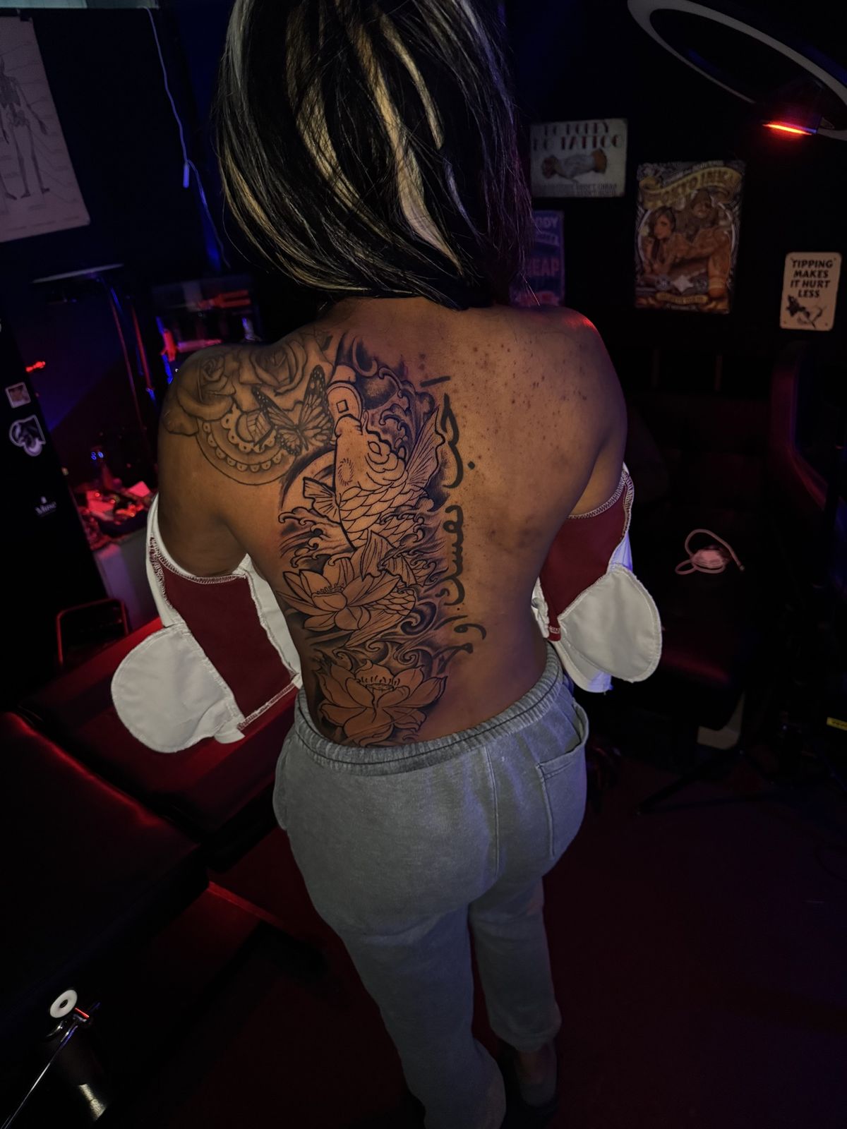 Koi fish back piece with lotus flowers and script